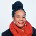 Miyesha smiles in her headshot